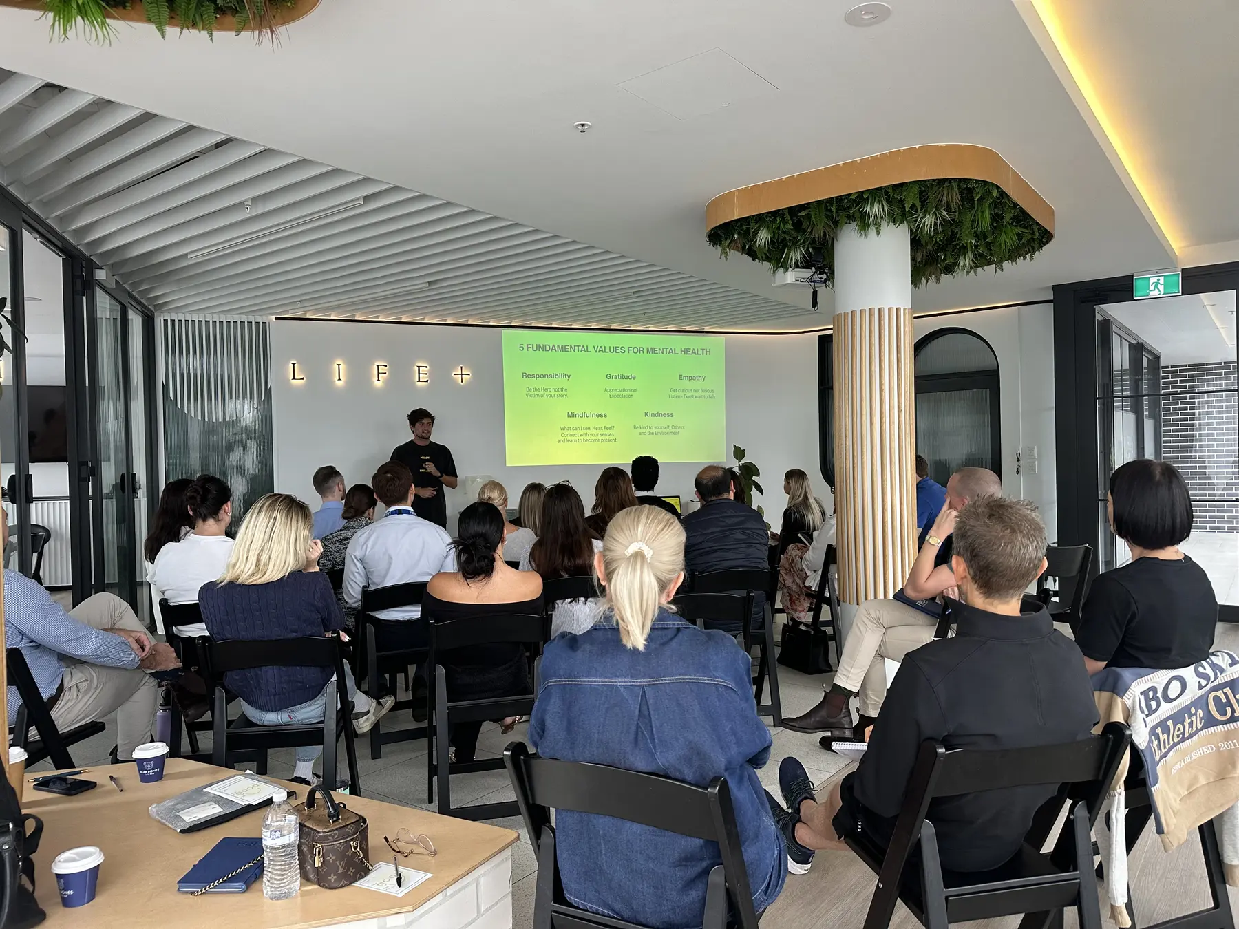 Cooper Chapman presenting a corporate wellbeing workshop at LIFE+